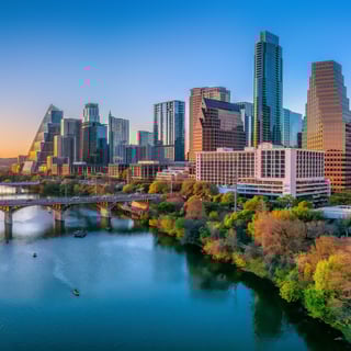 Austin, Texas- Panoramic cityscape and Colorado River against the sunset sky-1